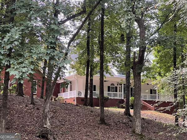 4.2 Acres of Residential Land with Home for Sale in Thomaston, Georgia