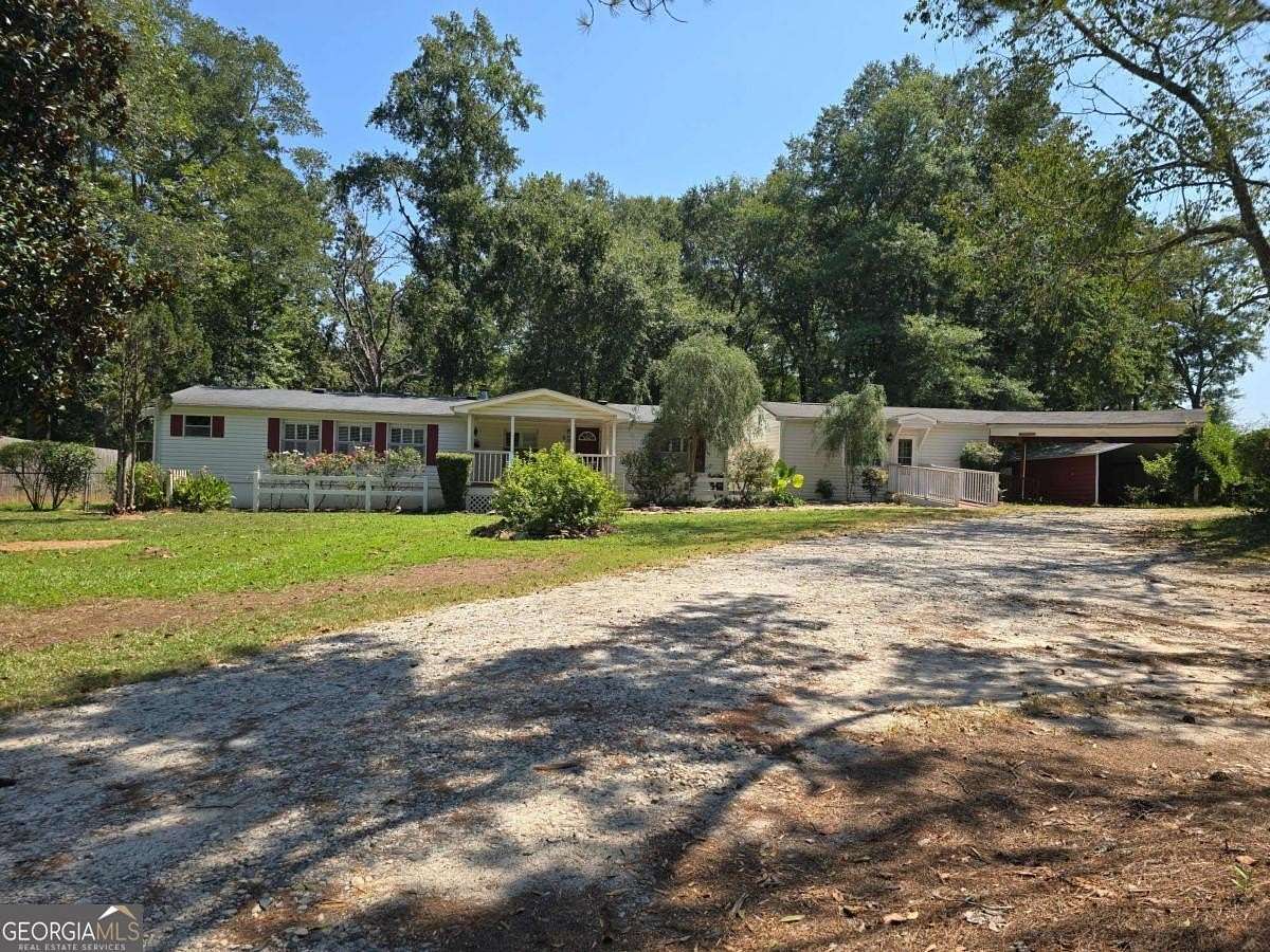 8.43 Acres of Residential Land with Home for Sale in Jackson, Georgia