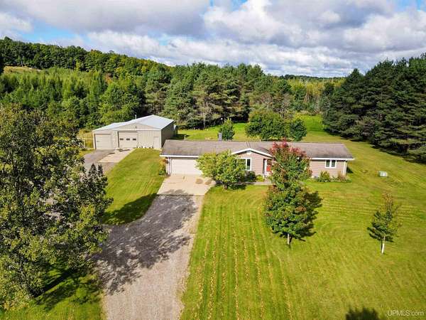 4 Acres of Residential Land with Home for Sale in Iron Mountain, Michigan