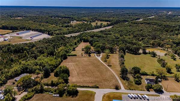 11 Acres of Recreational Land with Home for Sale in Eldon, Missouri