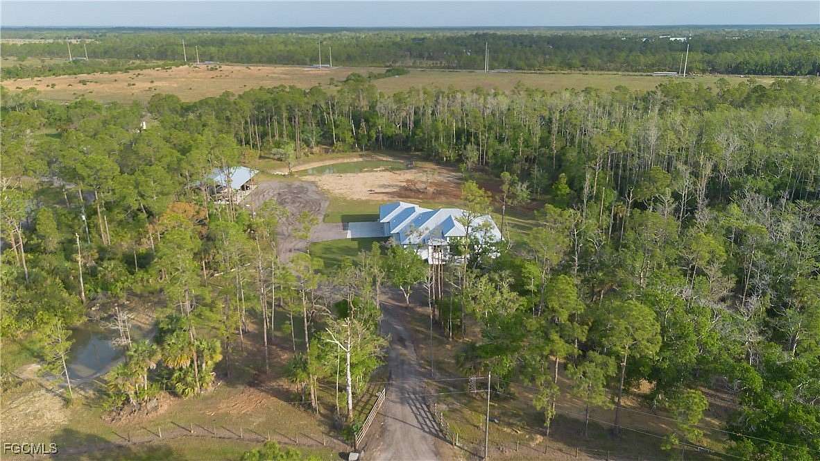 10.8 Acres of Land with Home for Sale in Alva, Florida