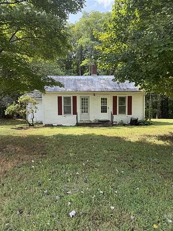 2.29 Acres of Residential Land with Home for Auction in Scottsville, Kentucky