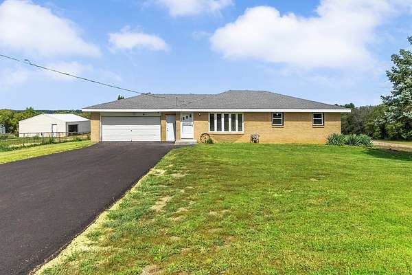 5 Acres of Land with Home for Sale in Winnebago, Illinois