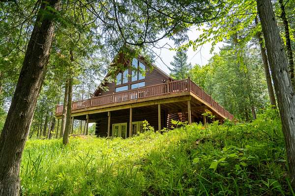 16 Acres of Recreational Land with Home for Sale in Tustin, Michigan