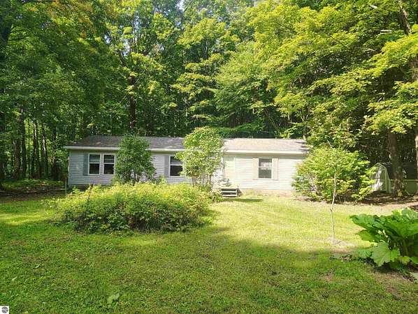 10 Acres of Land with Home for Sale in Mancelona, Michigan