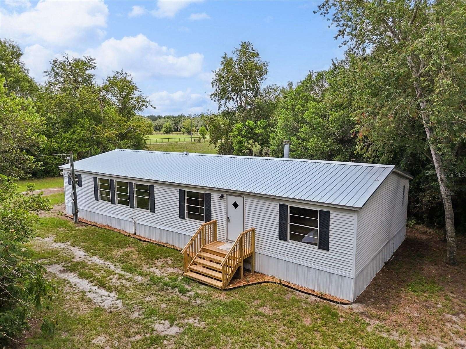 10.2 Acres of Land with Home for Sale in Bell, Florida