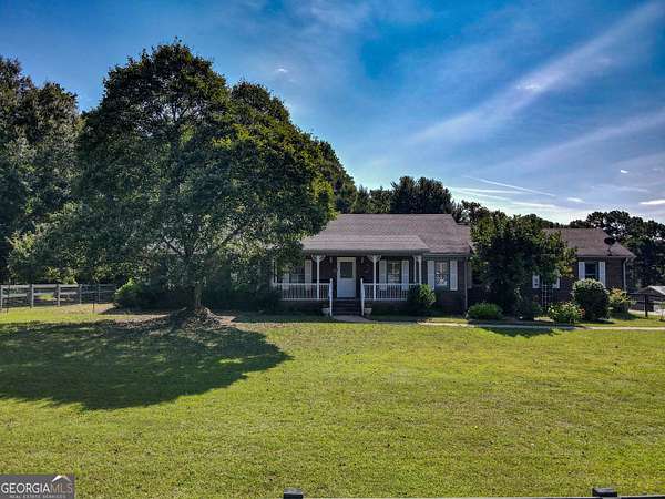 6.84 Acres of Land with Home for Sale in Douglasville, Georgia