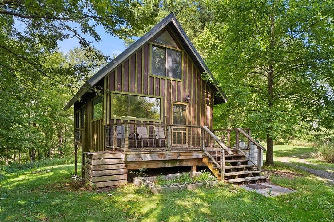 4 Acres of Residential Land with Home for Sale in Lansing, New York