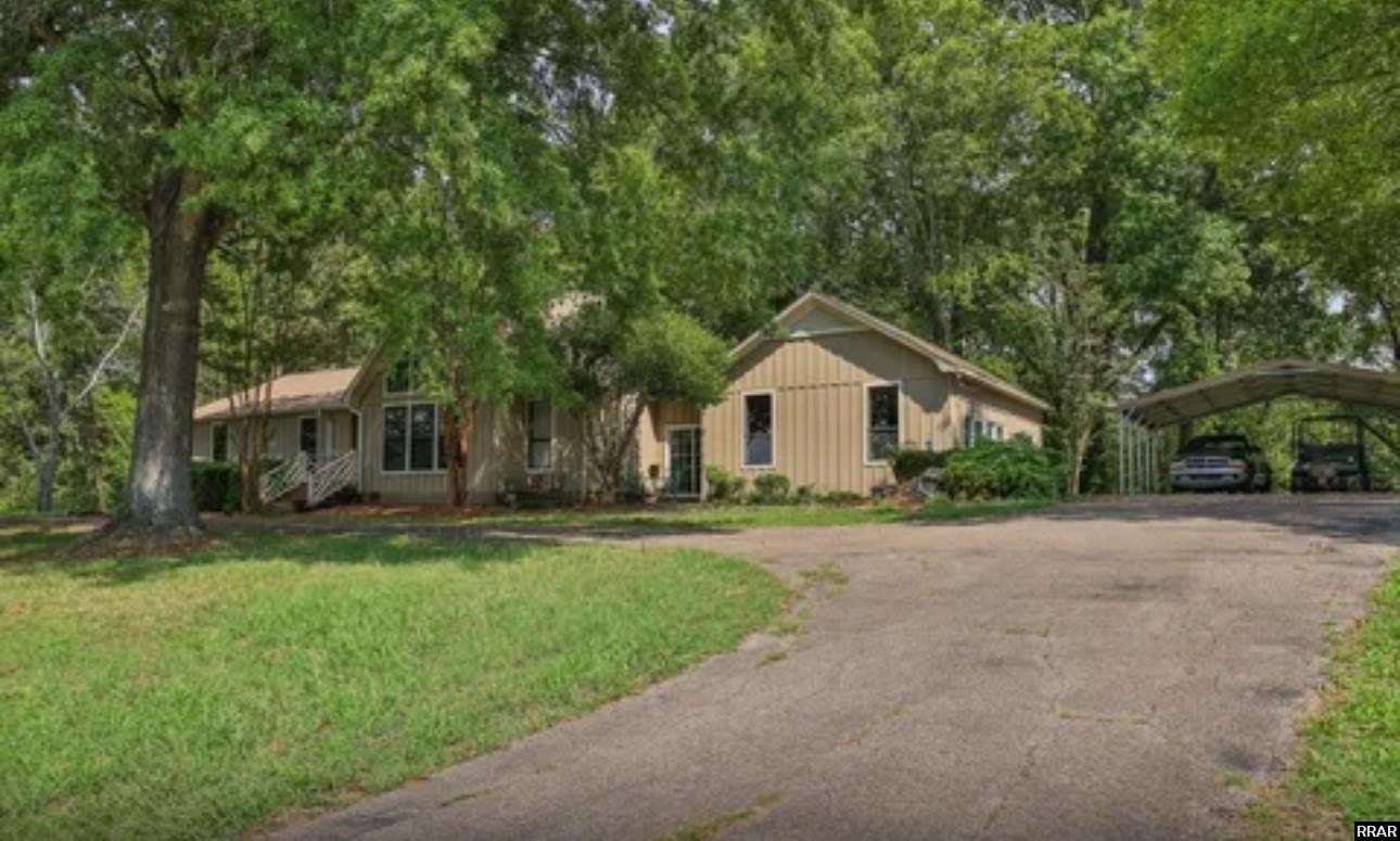 2 Acres of Residential Land with Home for Sale in Adamsville, Tennessee