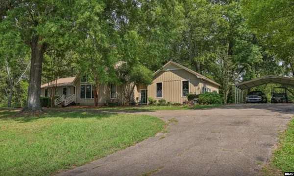 2 Acres of Residential Land with Home for Sale in Adamsville, Tennessee