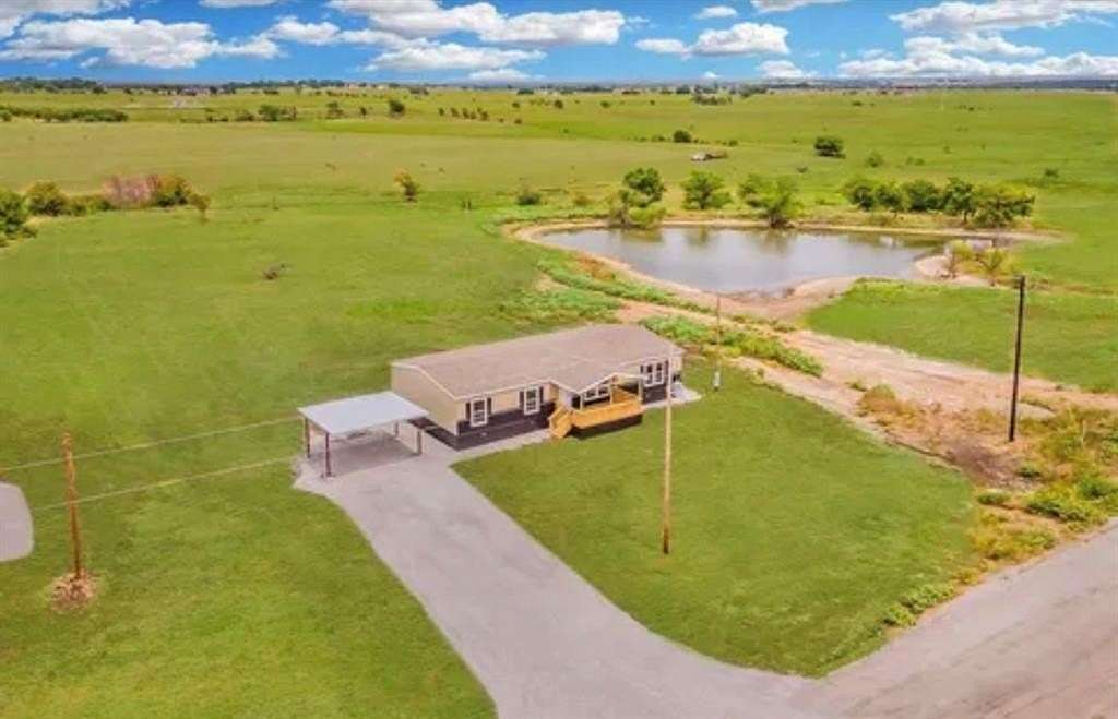 2 Acres of Residential Land with Home for Sale in Decatur, Texas