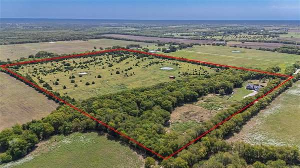 47.3 Acres of Agricultural Land with Home for Sale in Greenville, Texas