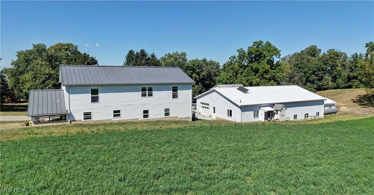 3 Acres of Residential Land with Home for Auction in Apple Creek, Ohio