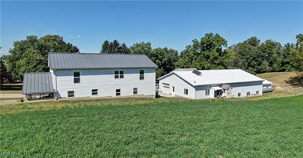 3 Acres of Residential Land with Home for Auction in Apple Creek, Ohio