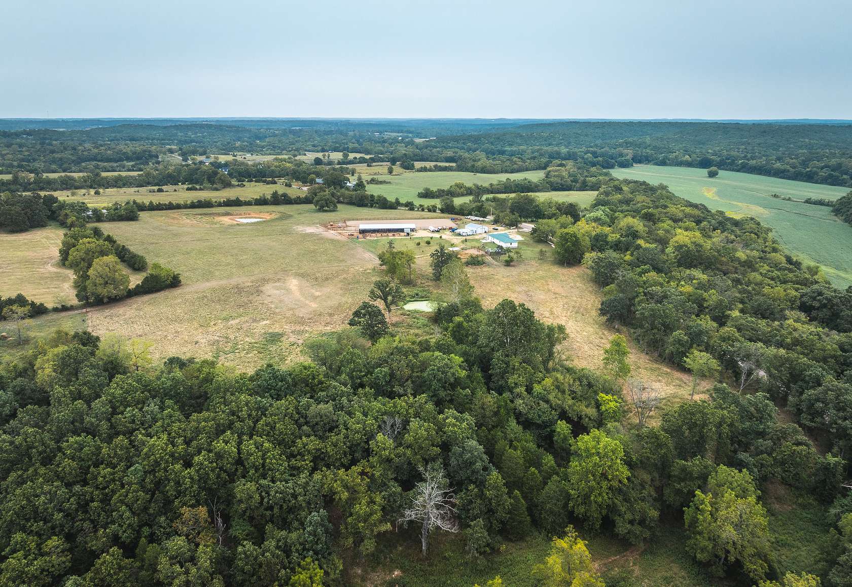 107 Acres of Land with Home for Sale in Lebanon, Missouri