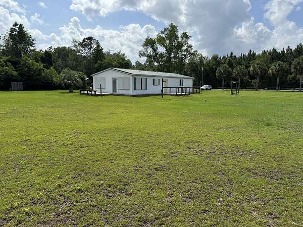 1.57 Acres of Residential Land with Home for Sale in Crawfordville, Florida