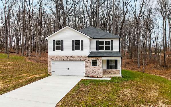 1.5 Acres of Residential Land with Home for Sale in Dickson, Tennessee