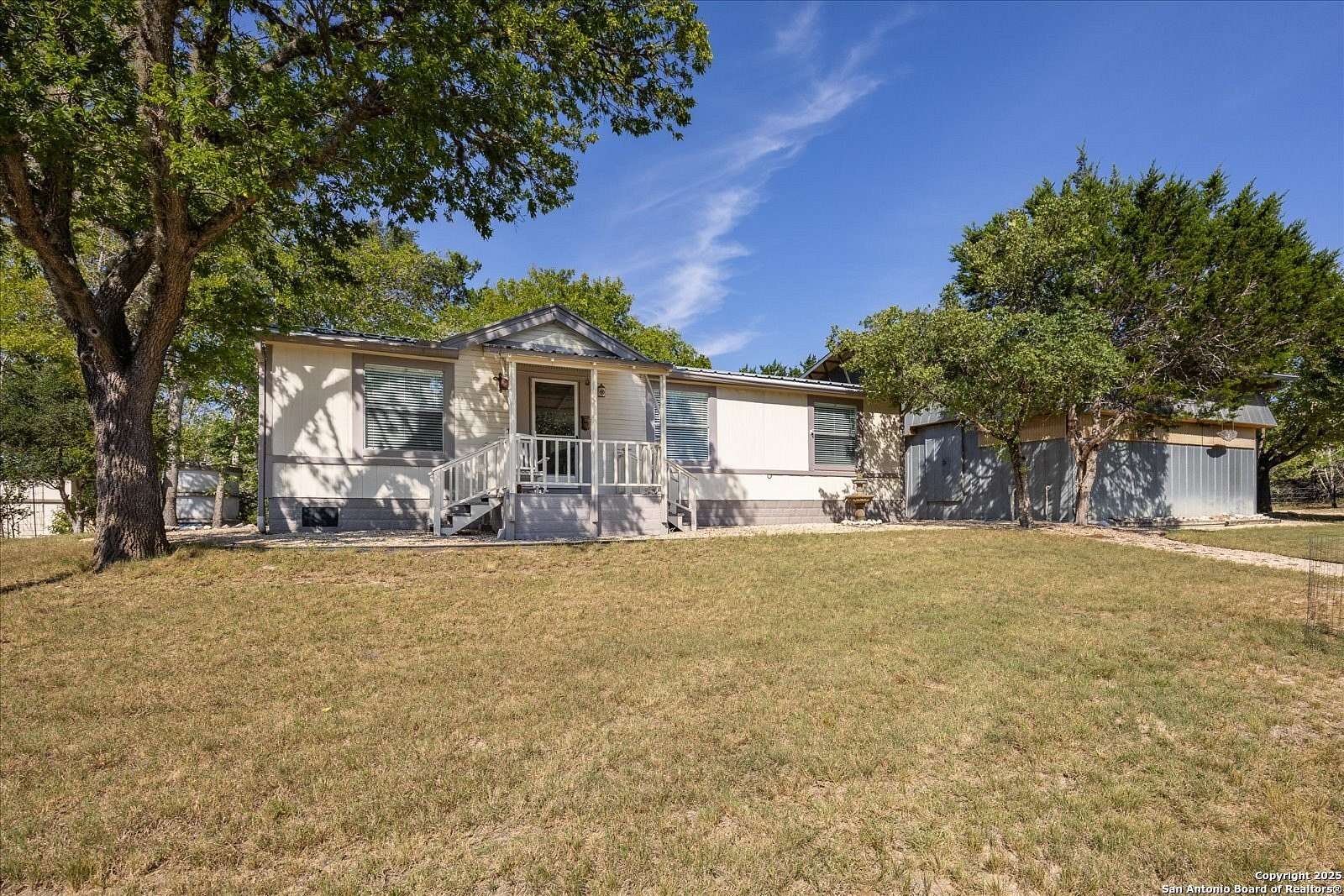 5.27 Acres of Land with Home for Sale in Center Point, Texas
