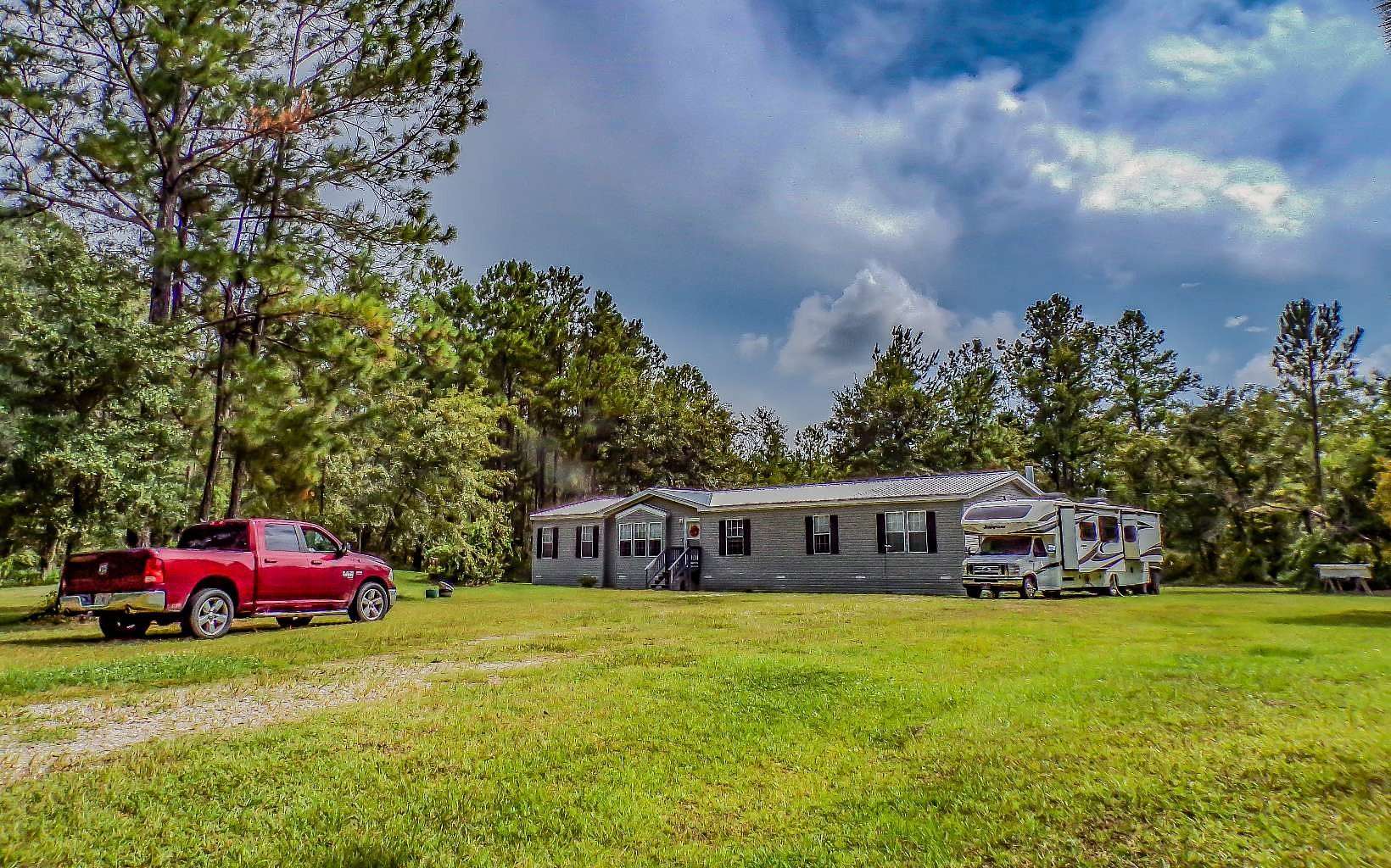 5 Acres of Residential Land with Home for Sale in Lake City, Florida