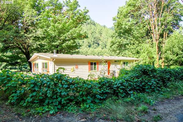 2.63 Acres of Residential Land with Home for Sale in Mapleton, Oregon