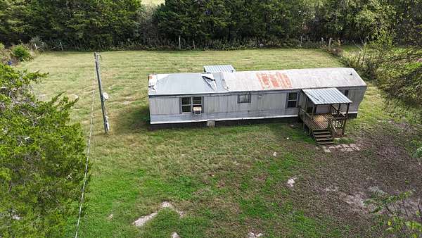 6.7 Acres of Residential Land with Home for Sale in Lewisburg, Tennessee