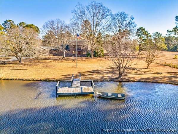 50.4 Acres of Land with Home for Sale in Orrum, North Carolina