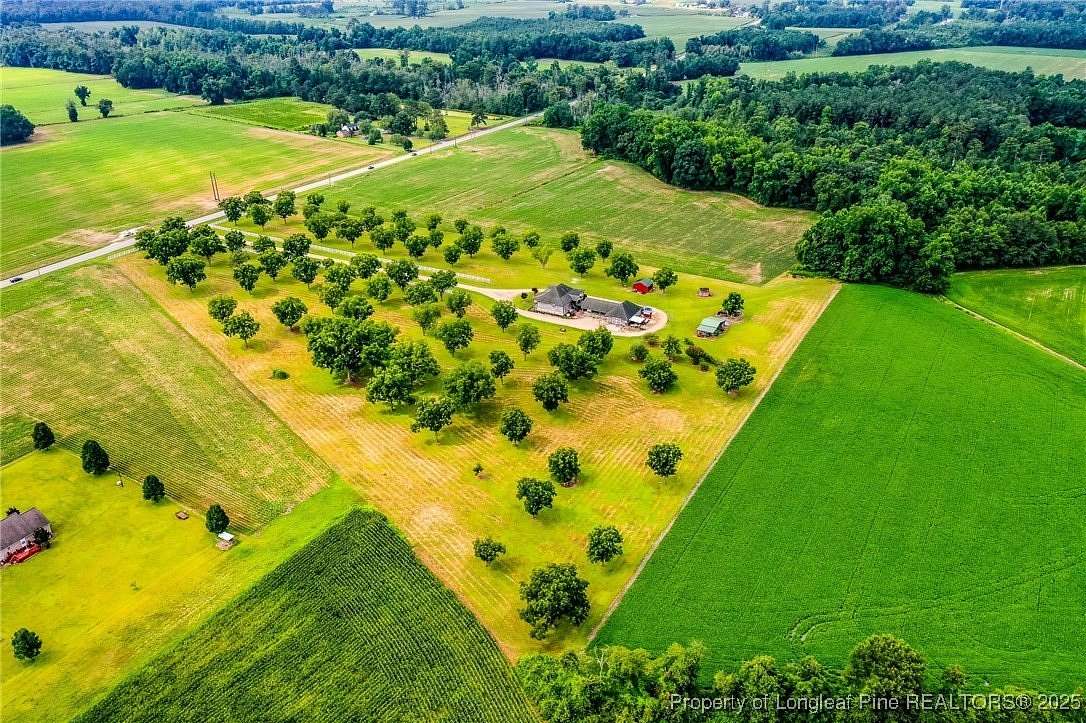 32 Acres of Agricultural Land with Home for Sale in Lumberton, North Carolina