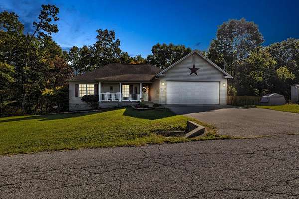 13.1 Acres of Land with Home for Sale in Hillsboro, Kentucky