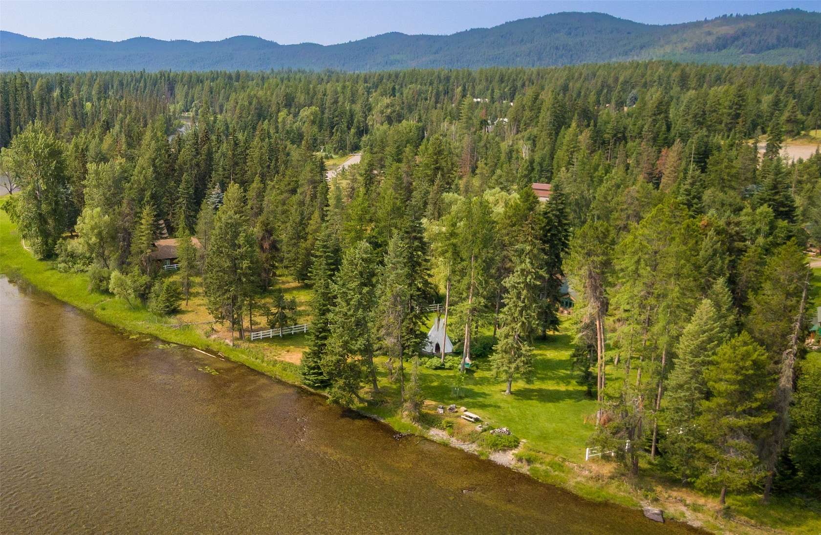 5.73 Acres of Residential Land with Home for Sale in Bigfork, Montana
