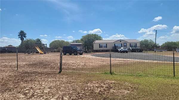 1.5 Acres of Residential Land with Home for Sale in Orange Grove, Texas