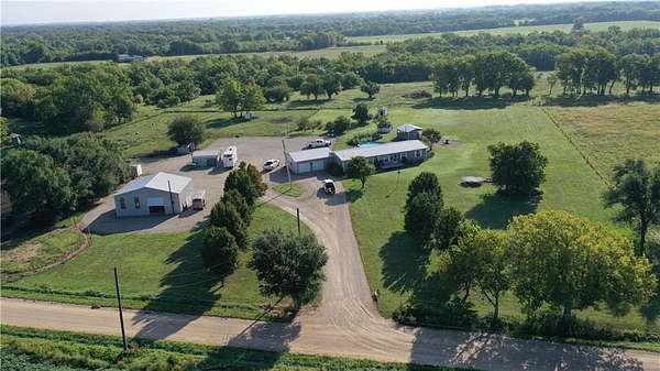 79 Acres of Land with Home for Sale in La Harpe, Kansas