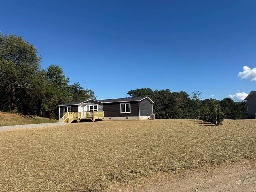 1.5 Acres of Residential Land with Home for Sale in Young Harris, Georgia