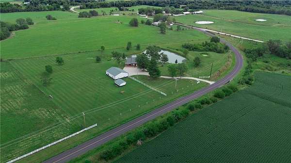 6.5 Acres of Residential Land with Home for Sale in Warrensburg, Missouri