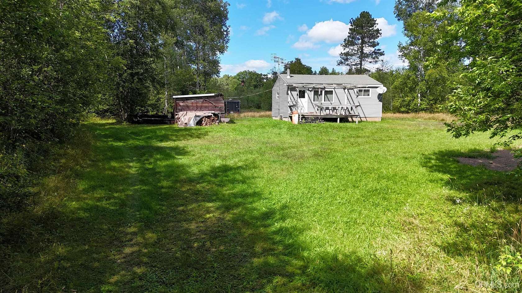 80.2 Acres of Recreational Land with Home for Sale in Crystal Falls, Michigan