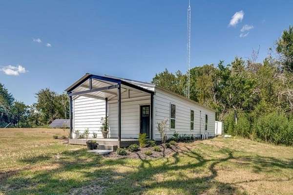 4.81 Acres of Residential Land with Home for Sale in Terrell, Texas