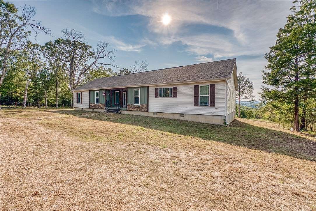 10 Acres of Land with Home for Sale in Lead Hill, Arkansas