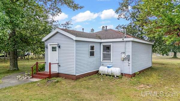 3 Acres of Residential Land with Home for Sale in Rapid River, Michigan