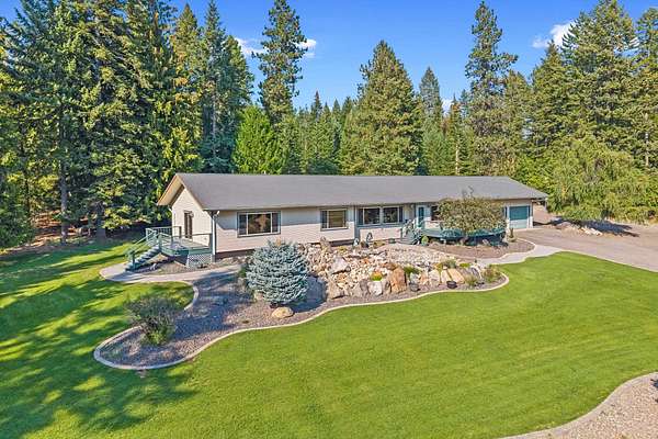 5.8 Acres of Residential Land with Home for Sale in Priest River, Idaho