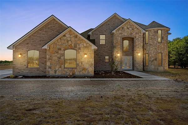 5 Acres of Residential Land with Home for Sale in Woodway, Texas