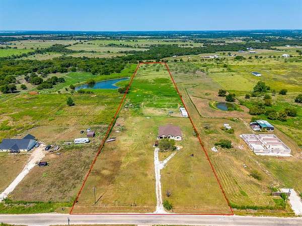10.3 Acres of Land with Home for Sale in Grandview, Texas
