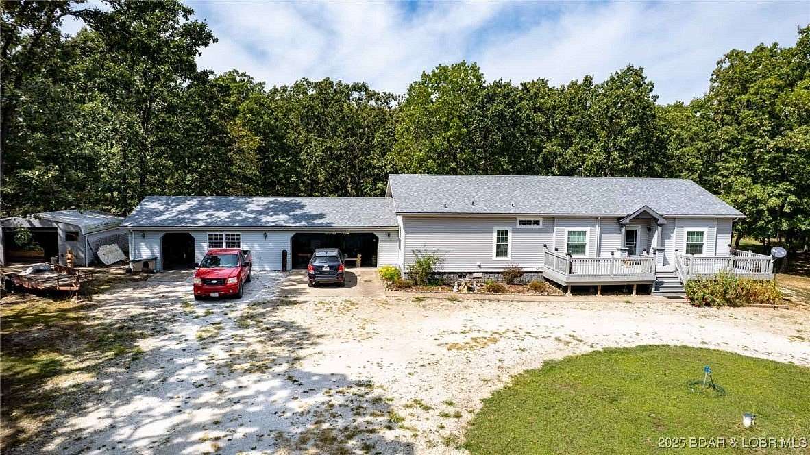 10.5 Acres of Land with Home for Sale in Stover, Missouri