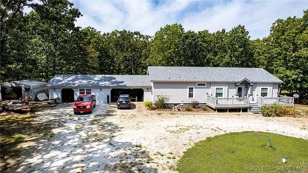 10.5 Acres of Land with Home for Sale in Stover, Missouri
