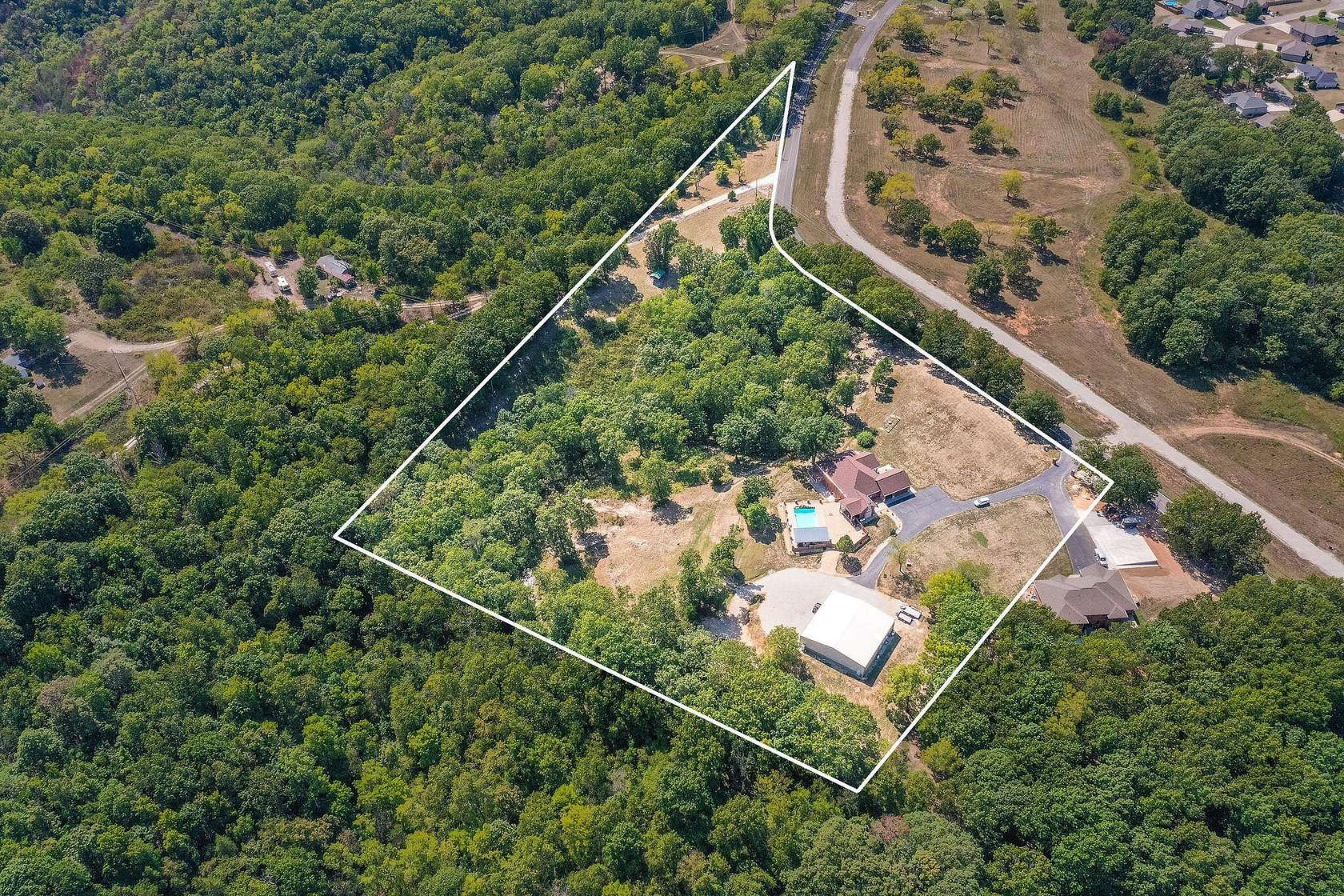 9.4 Acres of Residential Land with Home for Sale in Reeds Spring, Missouri