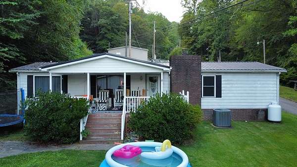 3.57 Acres of Residential Land with Home for Sale in McCarr, Kentucky
