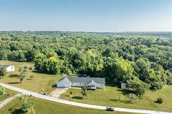 5 Acres of Residential Land with Home for Sale in Foley, Missouri