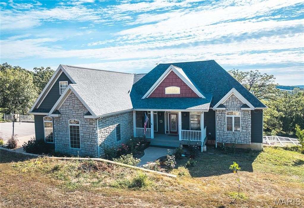 3.89 Acres of Residential Land with Home for Sale in Richland, Missouri