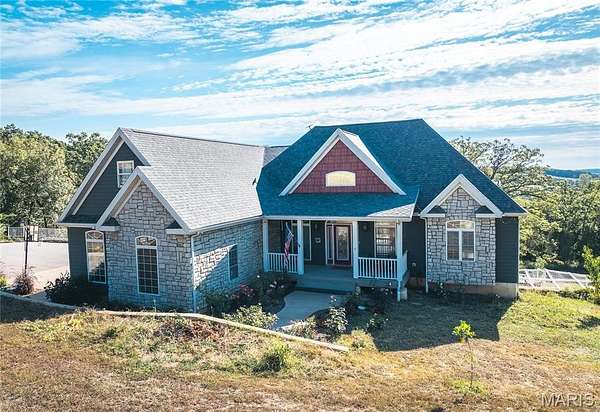 3.89 Acres of Residential Land with Home for Sale in Richland, Missouri