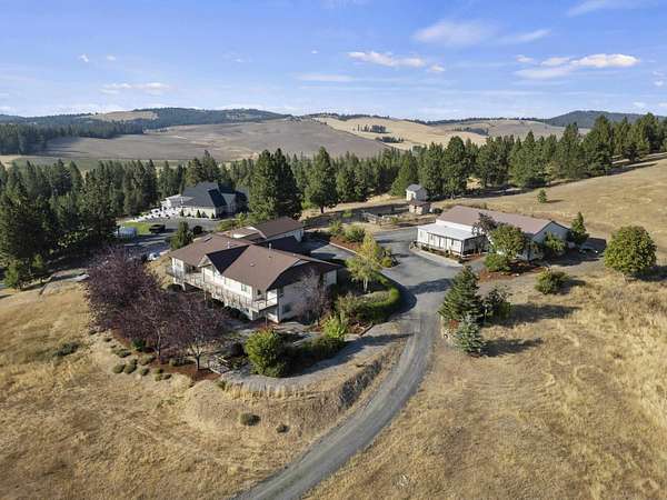 5.46 Acres of Residential Land with Home for Sale in Mica, Washington