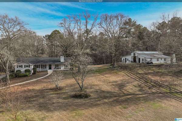 10.7 Acres of Land with Home for Sale in Columbiana, Alabama