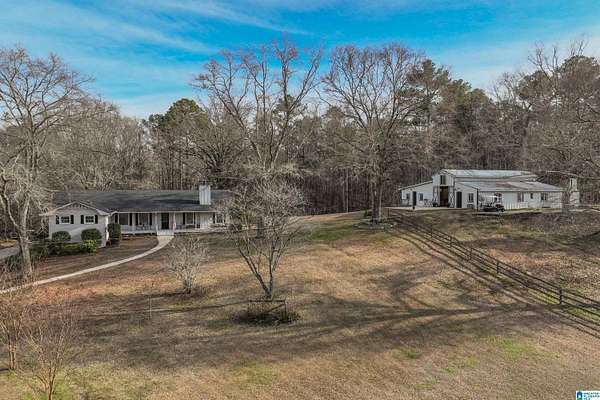 10.7 Acres of Land with Home for Sale in Columbiana, Alabama